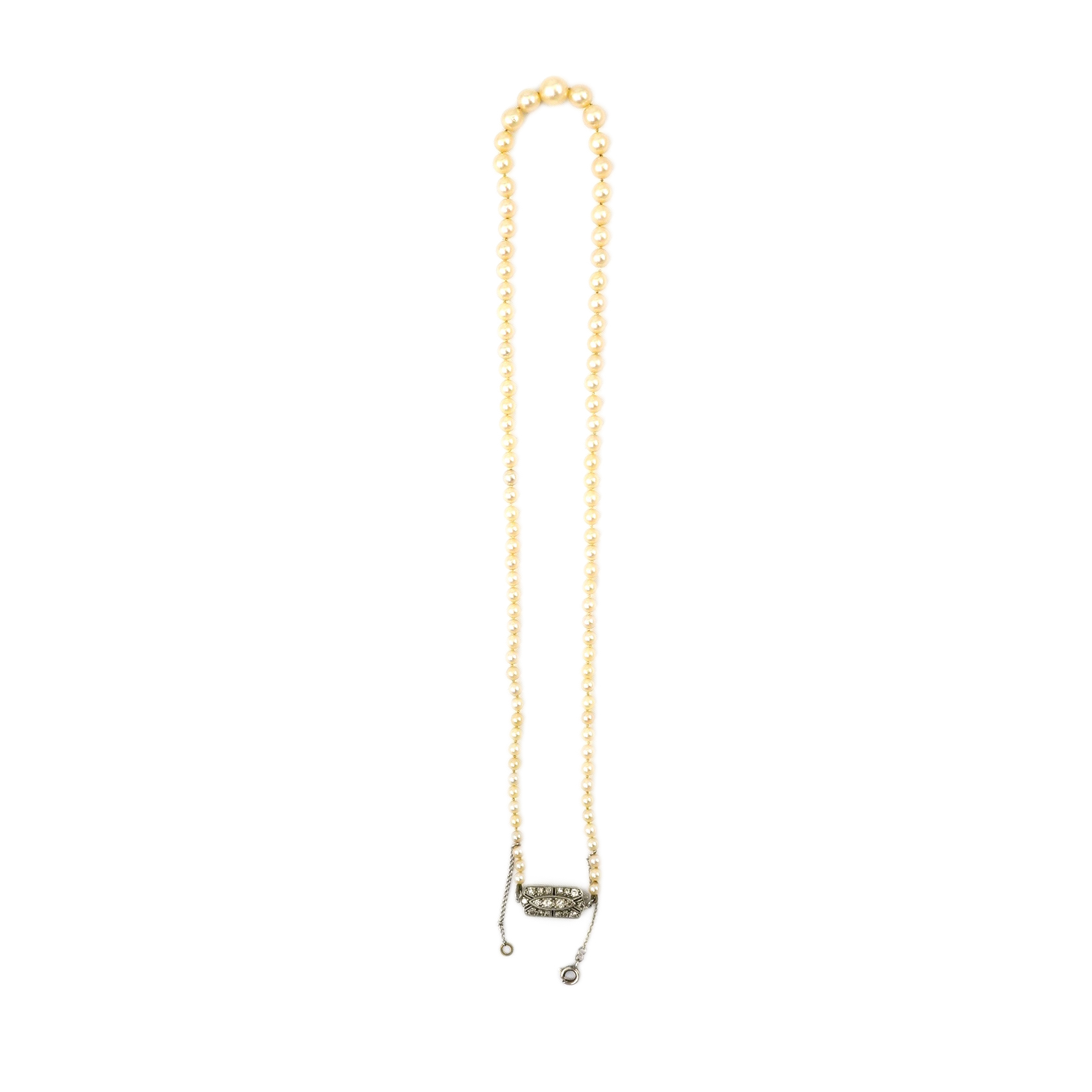 A single strand graduated cultured pearl necklace, with diamond cluster set white gold clasp